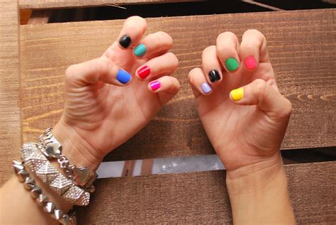 Black nails with different colors. multi-colored nails