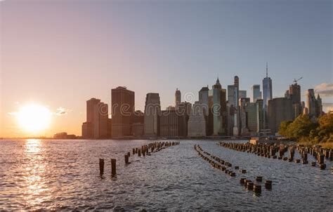 Beautiful Sunset And Lower Manhattan Skyline With East River And New