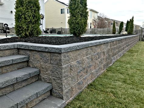 Retaining walls help to keep the soil in place. Landscape Retaining Walls Frederick County, MD - Barrick ...