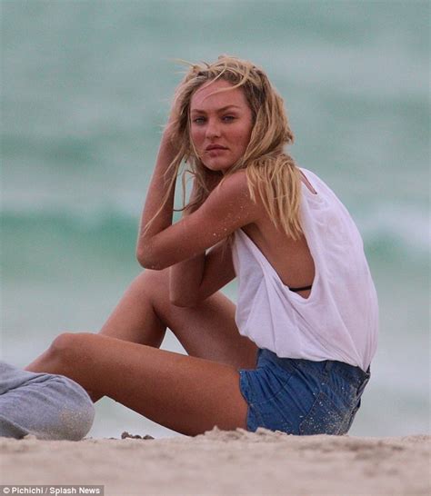 Candice Swanepoel Braves The Blustery Beach For Bikini Fashion Shoot In