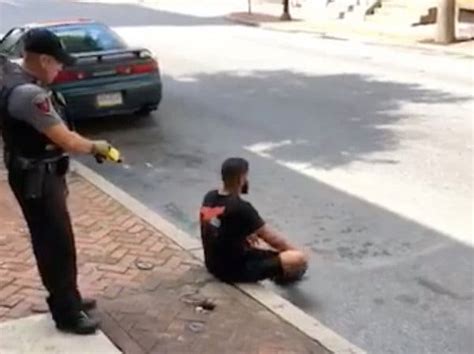Video Shows Police Officer Firing Stun Gun At Unarmed Man Sitting On