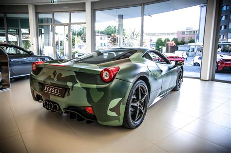 This particular ferrari 458 italia does a good job drawing attention to itself, which if you think about, defeats the whole purpose of camouflaging. Camo Ferrari 458 Italia Sells for $1.1 Million at AIDS Auction - GTspirit