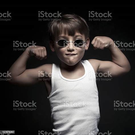 Small Kid Flexing Some Muscle Stock Photo Download Image Now Men