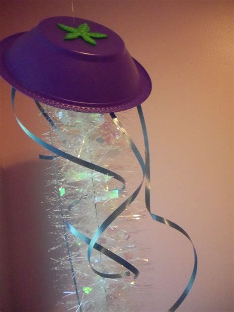 I f your kids are anything like mine, then they are fascinated with all things gooey and so making their own jellyfish in a bottle is guaranteed to be a hit!this realistic looking specimen is super easy to make and a project that the littlies will be able to get involved in and have hours of fun with afterwards. homemade Jellyfish decoration | Party: Mermaid | Pinterest
