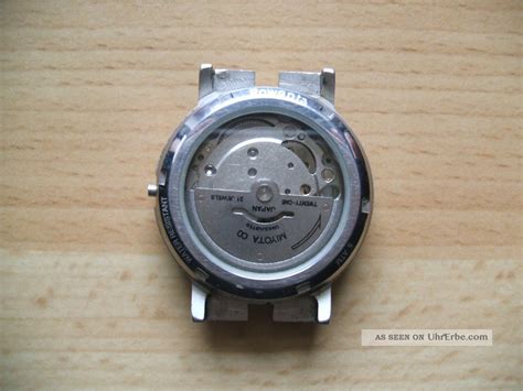 Inside the rolex inside a fake rolex daytona pretty poor copy, but its automatic movement, j12 i believe, watch case and case. Uhr Sammlung Alte Rowenta Automatik Miyota Uhrwerk 21 ...