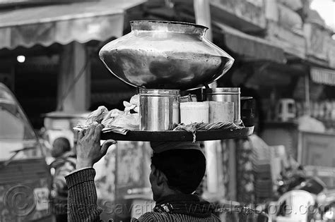 Street Vendor Holding Tray On His Head Large Copper Vessel Carrying