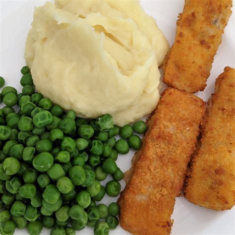 Mein Mittagessen Fischstäbchen mit Kartoffelpüree und Erbsen