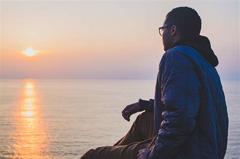 Photo Of Man Looking At Sunset