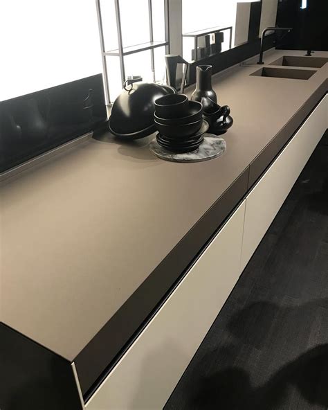 When you buy cabinetsmith kitchens you can rest assured that you are supporting canada first. FENIX live at Eurocucina. This #euromobil kitchen ...