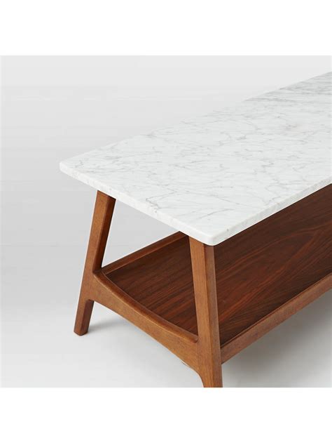 Solid wood base in a walnut finish. west elm Reeve Mid-Century Rectangular Coffee Table | Coffee table, Mid century coffee table ...