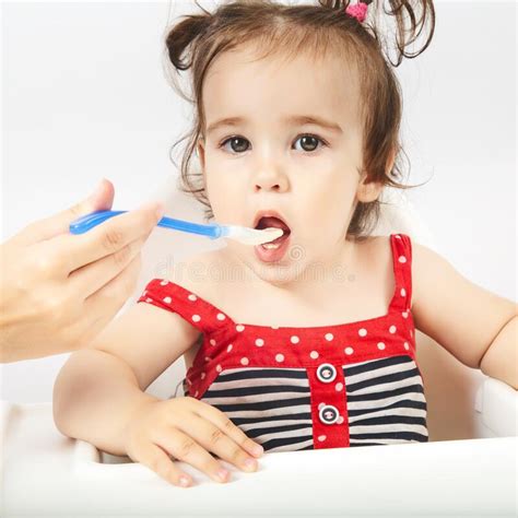 Cute Baby Eating Porridge Close Up Copy Space Stock Photo Image Of