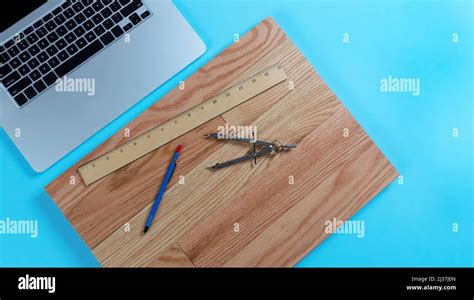 Blue Desktop With Architect Designer Tools Consisting Of Ruler