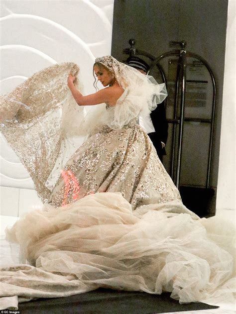 Jennifer Lopez Stuns In A Very Extravagant Bridal Ballgown As She Films