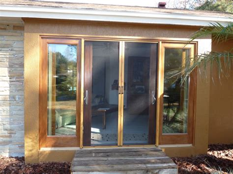 Retractable screens enclose large areas without obstructing views or detracting from architectural design. Comfortable Retractable Screen Doors | Sliding screen ...