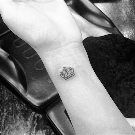 Who says bigger is necessarily better? 60 Wonderful Crown Tattoos For Your Writs
