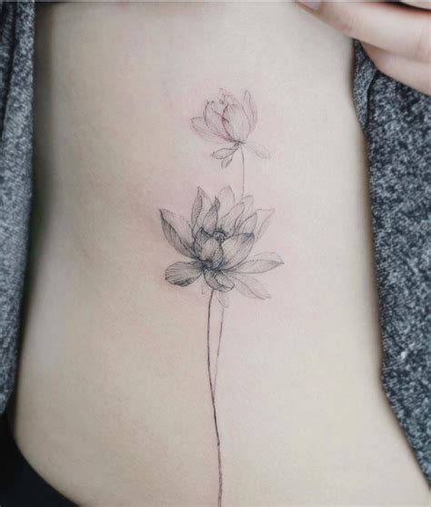 water lily minimalist tattoo