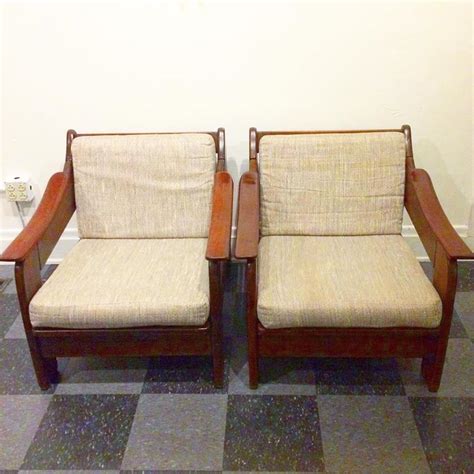 The cavett chair's slight recline angles you back comfortably with supportive cushions upholstered in a polyester basketweave that layers varied tones of brown. Pair of vintage wood frame lounge chairs - NVISION ...