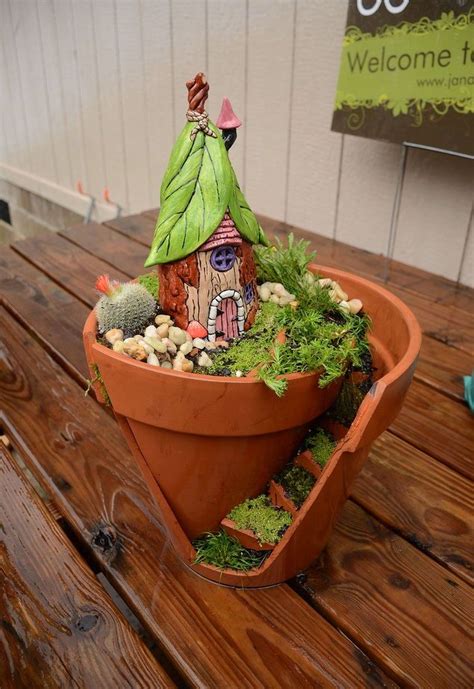 A colorful miniature garden with pots. Broken Pot Fairy Garden | Fairy garden crafts, Fairy ...