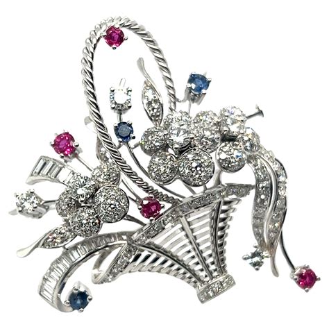 Floral Brooch with Diamonds, Rubies and Blue Sapphires in 18 Karat