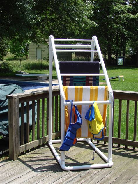 My pool towel (coat) rack works perfectly! PVC pool towel holder- like the idea to hold fabric | Pvc ...