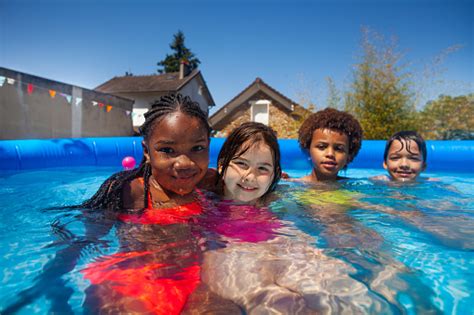 Group Small Kids Friends In Swimming Pool Together Stock