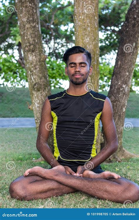 Young Yoga Man Practitioners Doing Yoga On Nature Asian Indian Yogis