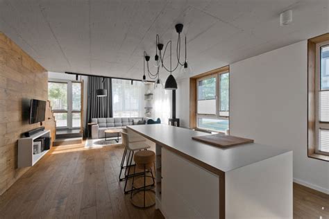 Bright white kitchen with household items. Scandinavian interior design in a beautiful small ...