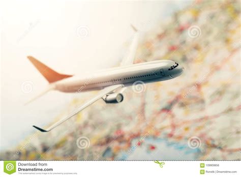 Airplane Is Flying High Above The City Stock Photo Image Of Aviation