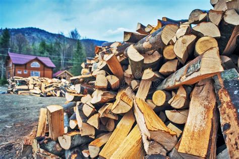 Firewood Pile Near Wooden House Stock Photo Image Of Autumn Heel