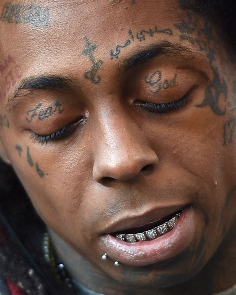 12 Most Fascinating Rapper Tattoos And The True Stories Behind Them