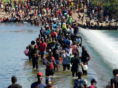 Shocking Photos Show Haitian Migrants Swimming Across The Rio Grand
