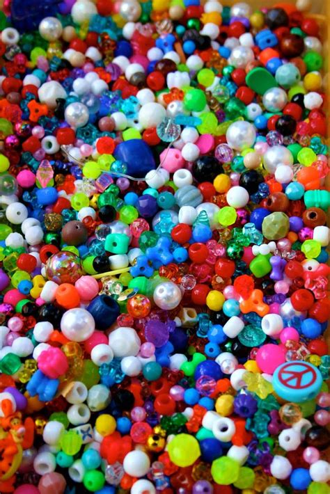 A Box Filled With Lots Of Different Colored Beads