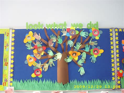 Bulletin Board Display Children Created Flowers And Leaves Using Their