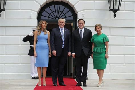 Photos Melania Trumps Fitted Blue Dress By Michael Kors
