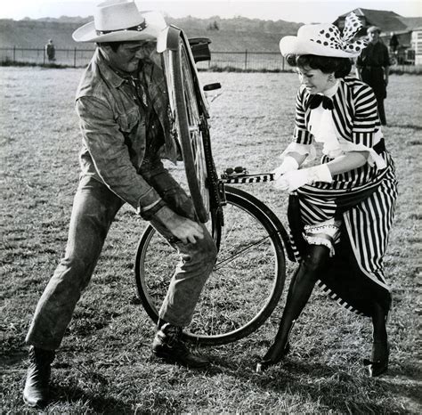 Stuart Whitman Wrestles A Bike Sarah Miles Gets Snagged In A Chain