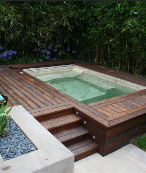 A hot tub can be built outside the pool, or even inside at a different level. Home Improvement Archives | Hot tub garden, Hot tub ...