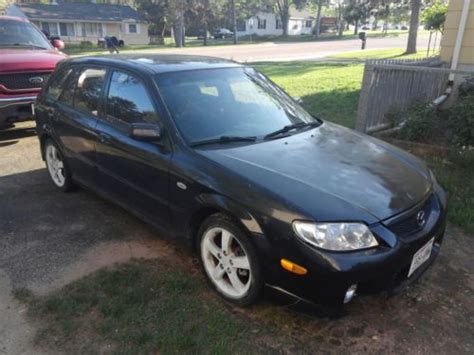 Well, i own a 2001 mazda protege lx sedan with at. Buy used 2003 Mazda Protege 5 2.0L GREAT GAS MILEAGE ...