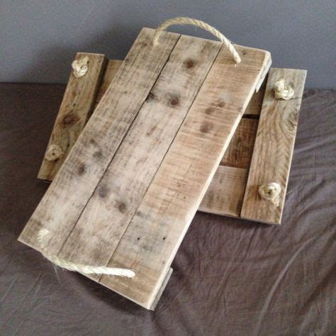 This wooden serving tray is not only fantastic in its appearance, but also offers a ton of decorating or serving options as well! Rustic reclaimed wooden serving tray with jute rope ...