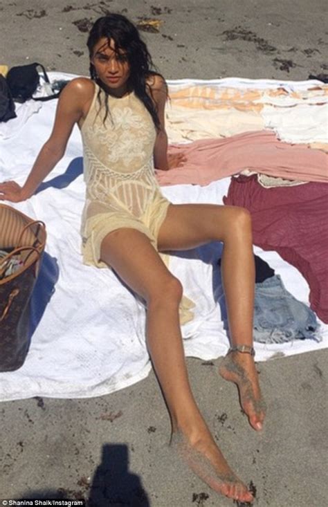 Shanina Shaik Braless In See Through Dress Flaunts Legs On Beach