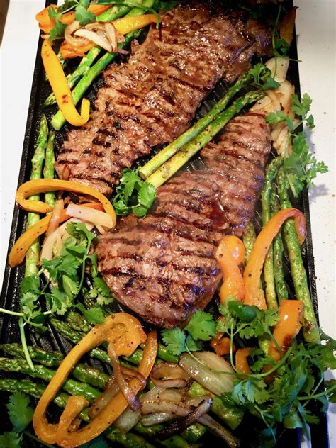 The meat was often eaten with eggs, which also had to be used up, and the precursor of the full english breakfast was born. Grilled Flap Steak with Asparagus | Recipe in 2020 | Flap ...