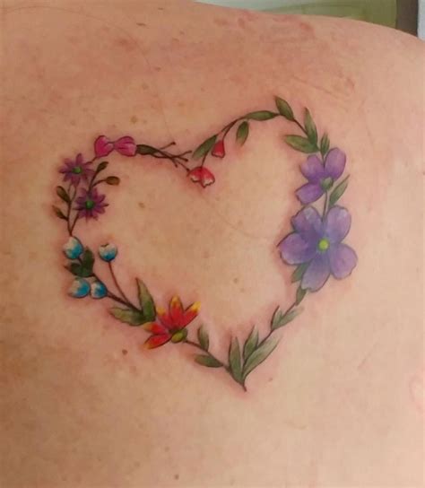 History has the anchor connected to christianity, and you can see that with the scripture reference here. Heart and flowers tattoo on shoulder #Tattoosonback ...