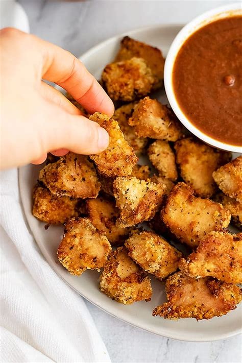 Arrange your frozen chicken nuggets in your air fryer basket so they are not overlapping. Air Fryer Chicken Nuggets | Bites of Wellness