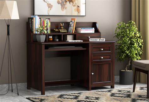 These can be modern study tables, and in case you love colours go for a plastic white study table to enjoy a modern look. Buy Nettle Study Table Cum Shelf (Walnut Finish) Online in India - Wooden Street