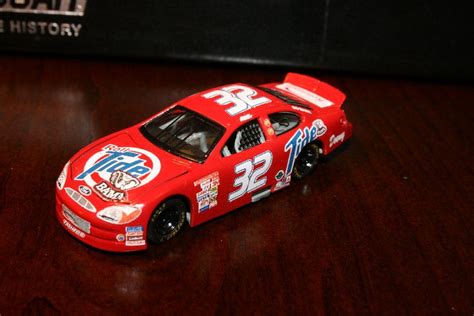 Get mark martin's nascar racecar go to the ford dealership, hit the link for lineup 2, buy yourself a ford taurus sho '99 ($30,980). Scott Pruett 2000 'Bama Roll Tide Ford Taurus | Toy car ...