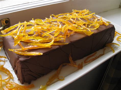 Take a large strip of orange zest with a thrifty knife; The Gourmet Project: Candied Orange Zest (Page 820)