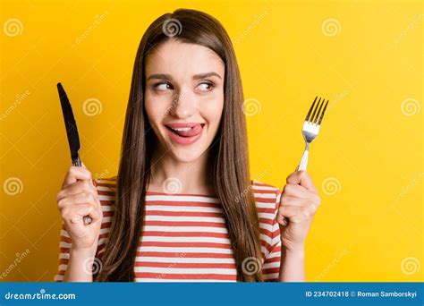 Portrait Of Attractive Cheerful Girlish Hungry Girl Holding Cutlery