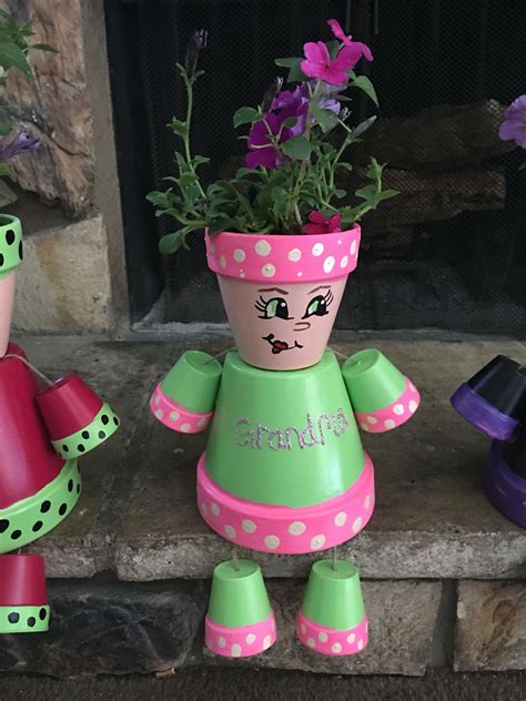 Pin By Ashley Wright On Mothers Day Clay Pot Crafts Clay Pot Projects Clay Pot People