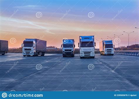 Trucks In A Parking Lot On A Suburban Highway Stock Photo Image Of