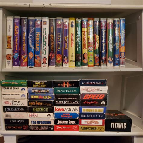 Anyone else collect VHS? The top shelf is from my childhood and the