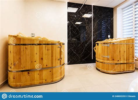 Cedar Spa Barrels In Light Hall Of Modern Wellness Center Stock Image